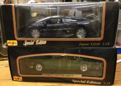 A boxed MAISTO Special Edition Jaguar XJ220 togeth