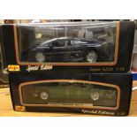 A boxed MAISTO Special Edition Jaguar XJ220 togeth