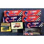 A boxed CORGI diecast toy bus together with other