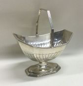 A Victorian silver half fluted sugar bowl on shape