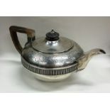A good heavy Georgian silver teapot attractively d