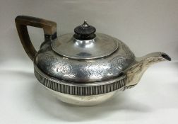 A good heavy Georgian silver teapot attractively d