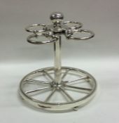 A good silver plated Hermes cruet stand on ball fe