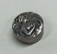 A stylish silver Arts & Crafts pill box with gilt