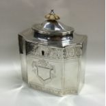 A rectangular Georgian silver tea caddy with brigh