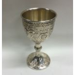 A good quality chased silver goblet of scroll form