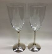 A good pair of silver and glass champagne flutes o