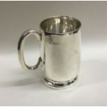 A small baluster shaped cylindrical mug. Sheffield