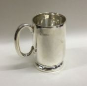 A small baluster shaped cylindrical mug. Sheffield