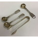 A group of three silver fiddle pattern salt spoons