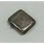 A large hammered effect silver vesta case with hin