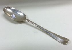 A silver and rat tail pattern dessert spoon of typ