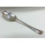 A silver and rat tail pattern dessert spoon of typ