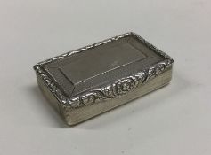 A good silver snuff box attractively decorated wit
