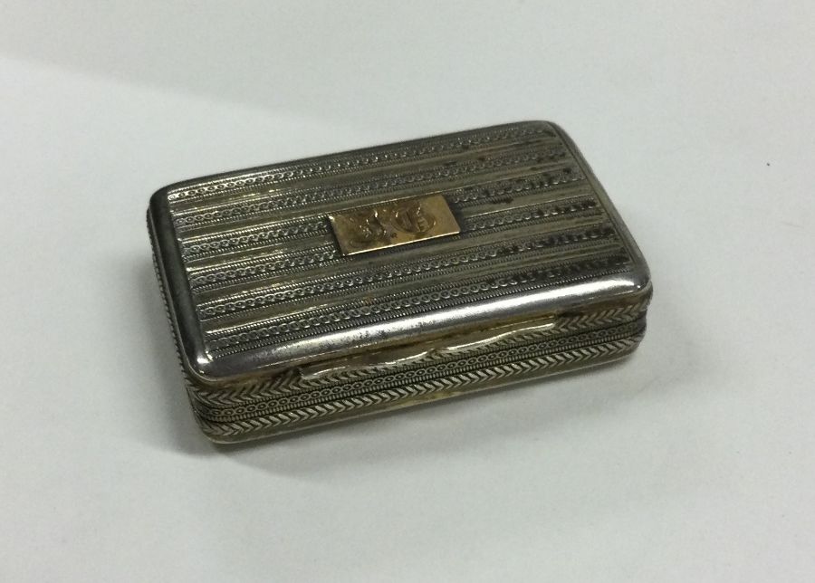 A fine quality silver and silver gilt snuff box. B