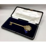 A cased silver gilt presentation key. Birmingham.