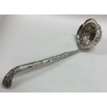 EDINBURGH: A rare cast Scottish silver ladle embos