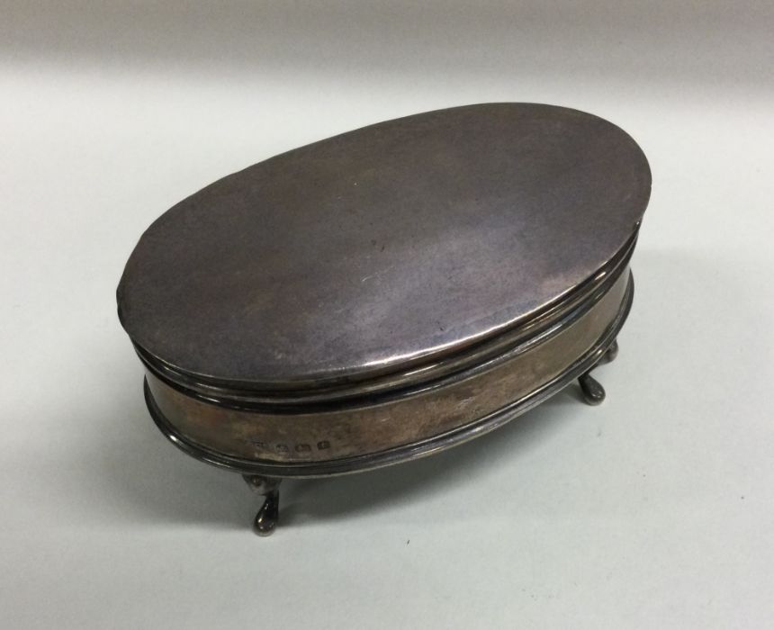 An oval silver hinged top ring box. Birmingham. By - Image 2 of 2