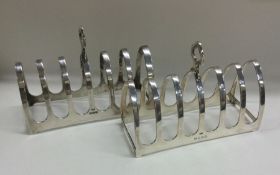 A good matched pair of seven bar silver toast rack