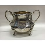 A good quality Victorian silver sugar bowl decorat