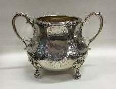 A good quality Victorian silver sugar bowl decorat