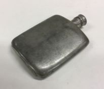 A heavy pewter hip flask. Est. £10 - £20.