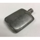 A heavy pewter hip flask. Est. £10 - £20.