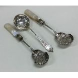 A pair of silver plated preserve spoons together w