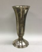 A tapering silver spill vase. Birmingham 1906. App