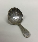 A good Georgian silver caddy spoon with bright cut