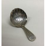 A good Georgian silver caddy spoon with bright cut