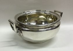 A heavy Georgian silver two handled bowl with gilt