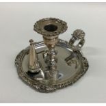 A miniature Georgian silver taper stick together w