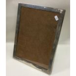 An attractive rectangular silver picture frame eng