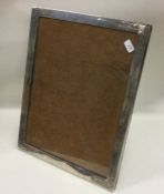 An attractive rectangular silver picture frame eng