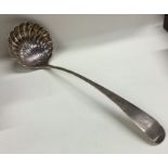 EDINBURGH: A large silver OE pattern soup ladle wi