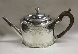 A good Georgian silver bright cut teapot attractiv