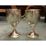 A good pair of Georgian silver goblets of plain fo