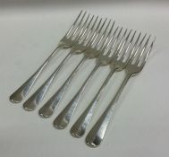 A matched set of six silver three prong forks. App