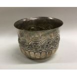 A chased silver half fluted sugar bowl. London. B