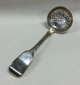 EXETER: A fiddle pattern silver sifter spoon. By J