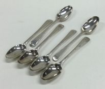 A set of six Georgian silver bead edge teaspoons.