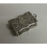 A Victorian hinged silver vinaigrette with gilt in