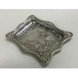 A rectangular silver pin dish decorated with 'Mr P