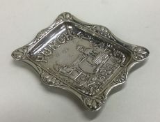 A rectangular silver pin dish decorated with 'Mr P