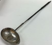 A Georgian silver toddy ladle with coin inset to w