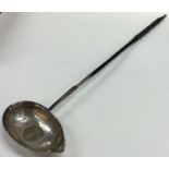 A Georgian silver toddy ladle with coin inset to w