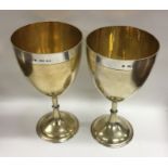 A good pair of silver and silver gilt goblets. Lon