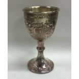 A good quality chased silver goblet of scroll form