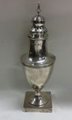 A good Georgian silver sugar caster with reeded bo